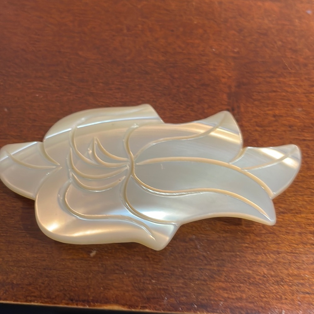 Vintage mother of pearl hand carved flower brooch
